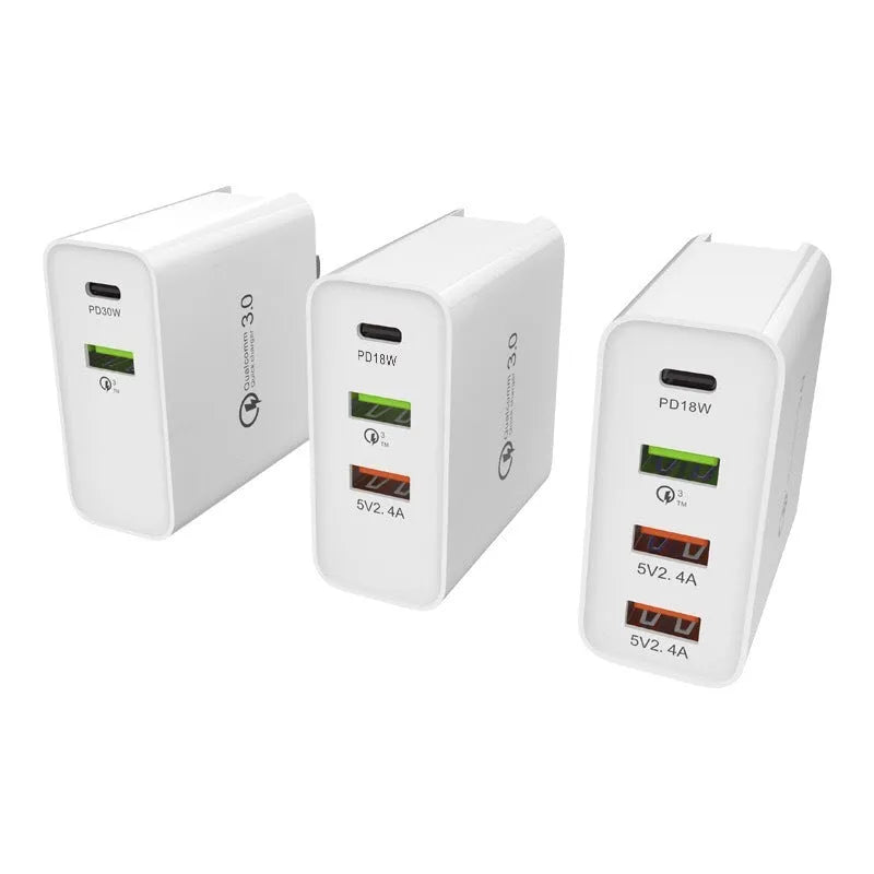 Multi-port fast wall charger with PD and QC support in black or white with international plug adapters