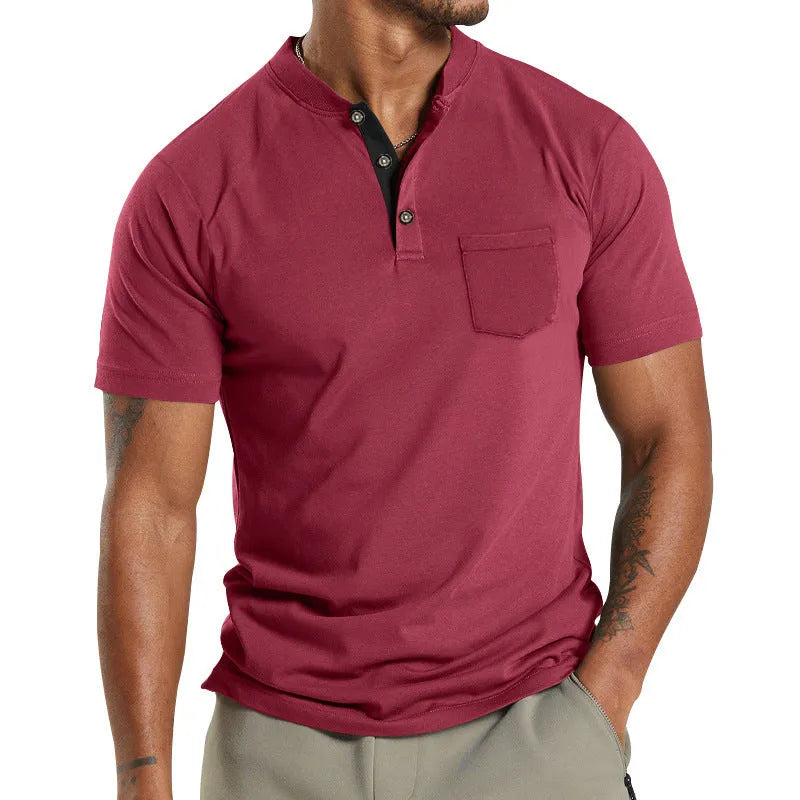 Plus size man wearing a light grey short sleeve casual shirt with a button chest pocket.
