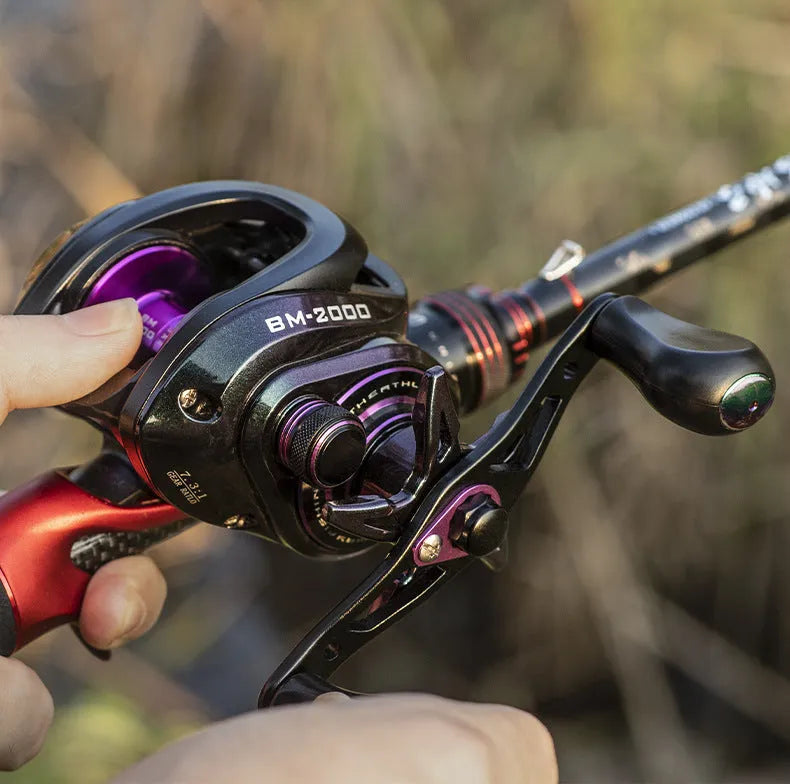 BM2000 fishing reel with water drop design and colourful finish showing magnetic brake system