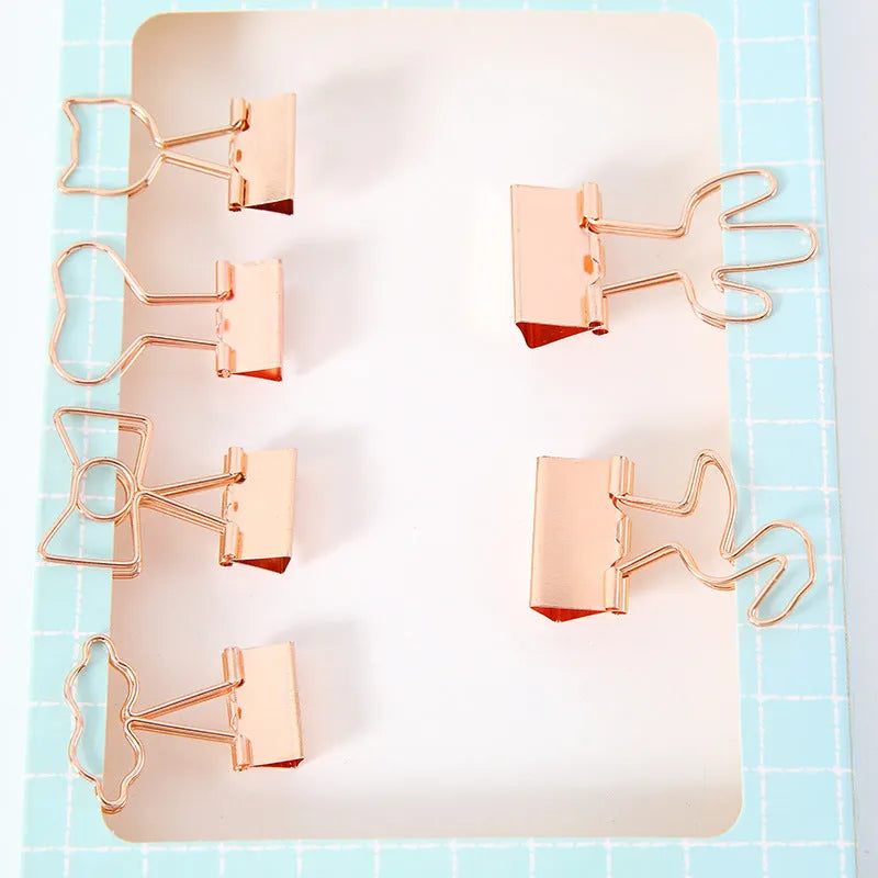 Gold decorative metal paper clips in flamingo, love heart, cloud, cat, cactus and bow shapes