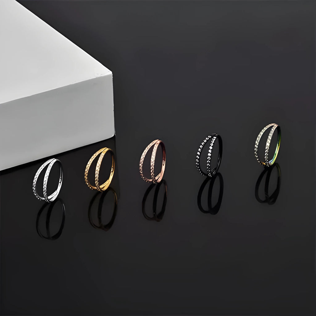 Titanium alloy nose ring in gold and steel colour finishes with size gauge options