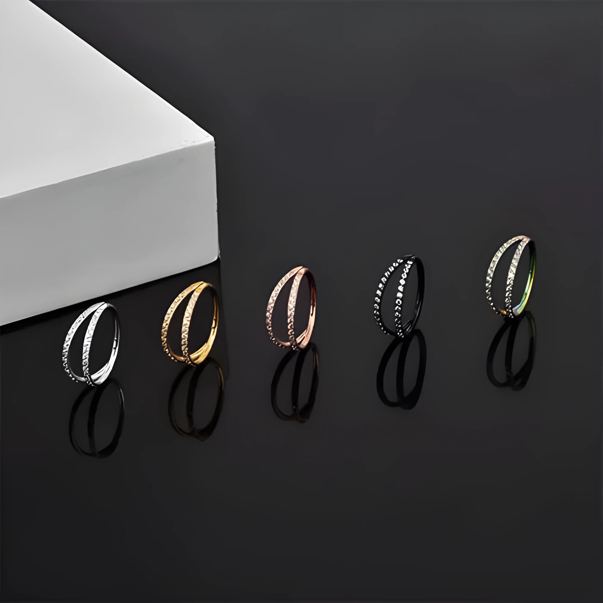 Titanium alloy nose ring in gold and steel colour finishes with size gauge options