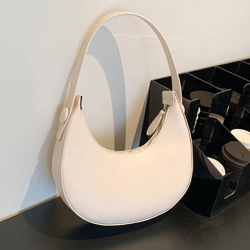 Retro women's dumpling-shaped shoulder bag in PU leather with zippered pocket