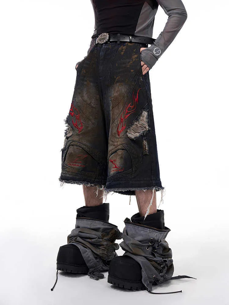 Men's retro denim jeans with detachable trouser legs showing wide-leg cut and mid-high waist