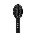 KD3802 Black scalp massage device with multifunctional vibration on a plain background.