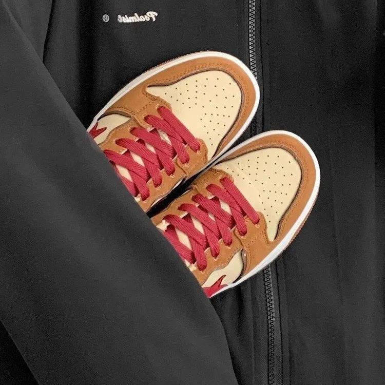 Brown women's lace-up platform sneakers with sequin details and a rubber sole.