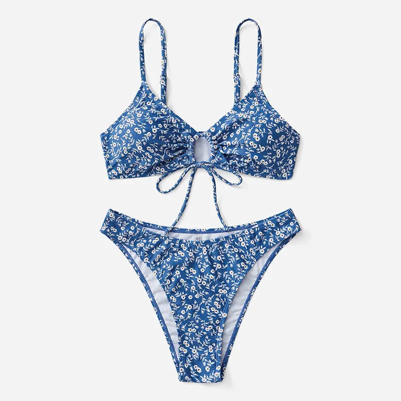 Blue three-piece swimsuit set consisting of a top and shorts, made from polyester fabric.