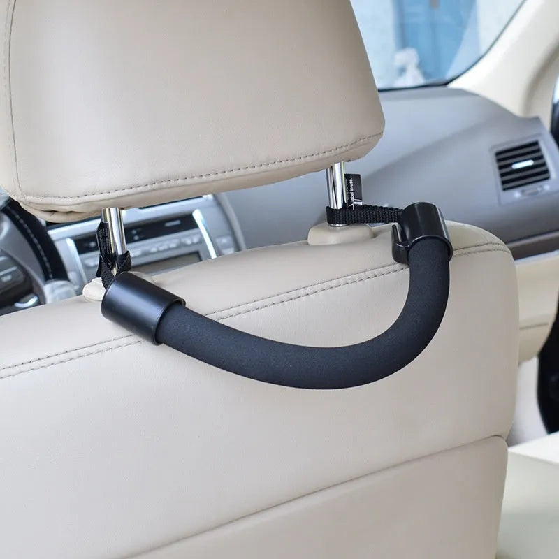 Black car seat back safety armrest made of EVA and ABS, 30.2 x 3.5 cm, installed behind seat