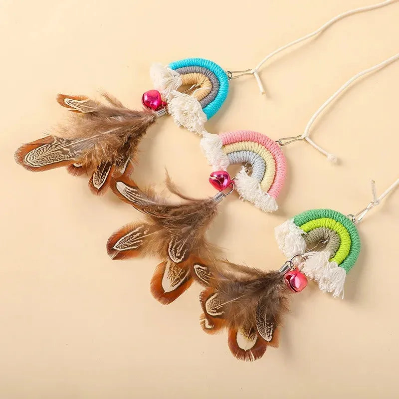 Blue feather rope cat toy hanging from door with elastic swing and sticky buckle clamp