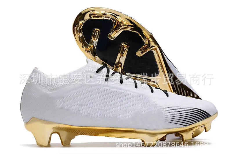 Men's low top waterproof knitted football shoes with FG rubber studs on white background