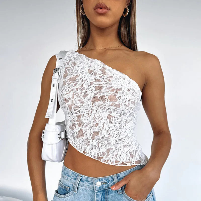 Women's apricot lace backless sleeveless top with an asymmetrical neckline on a hanger.