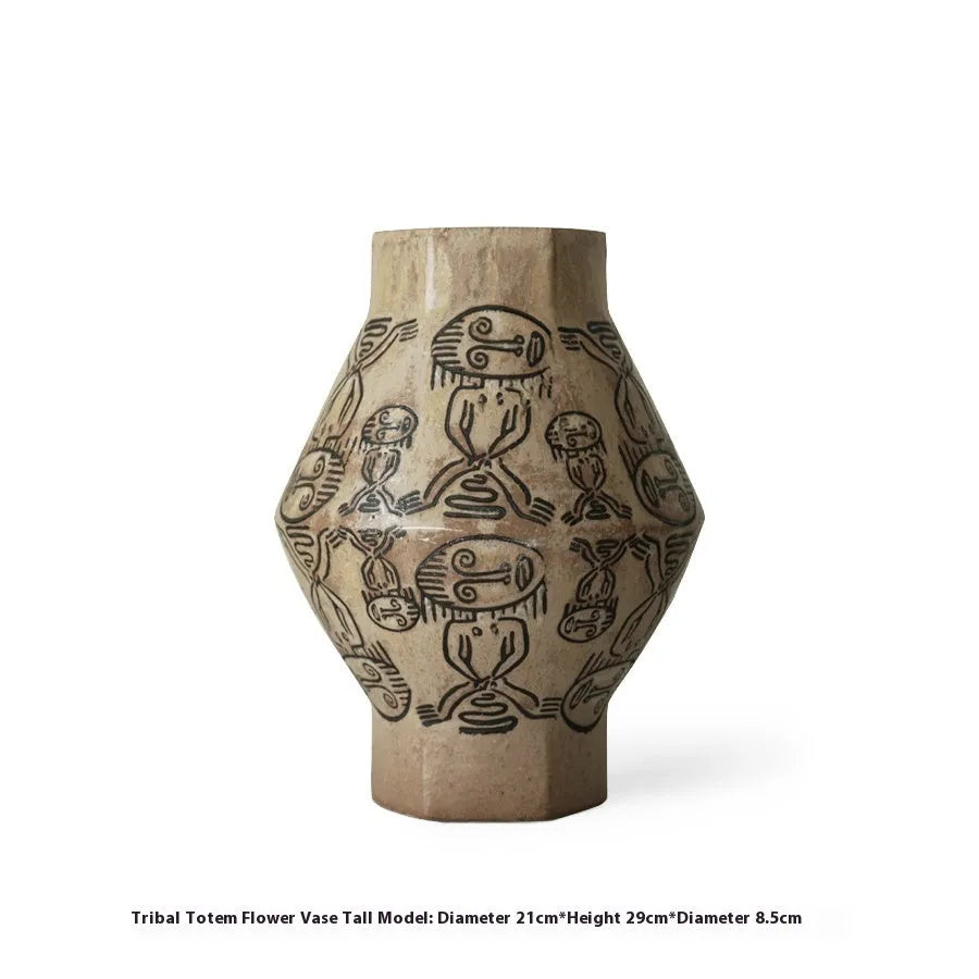 Hand-painted ceramic vase with vintage carved religious patterns in tribal totem colours