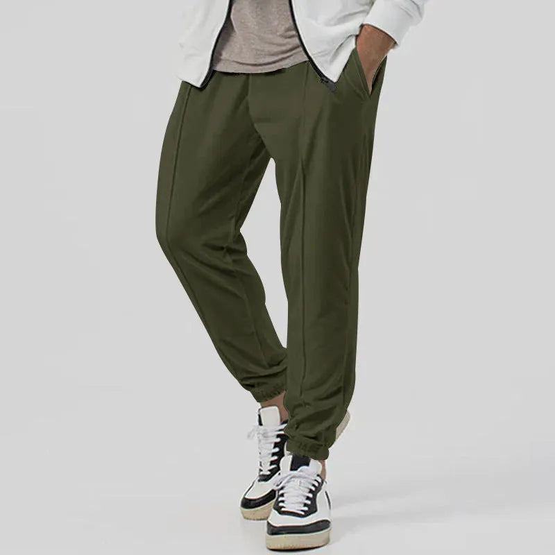 Men's casual track sweatpants in loose tapered straight-leg design showing army green colour option