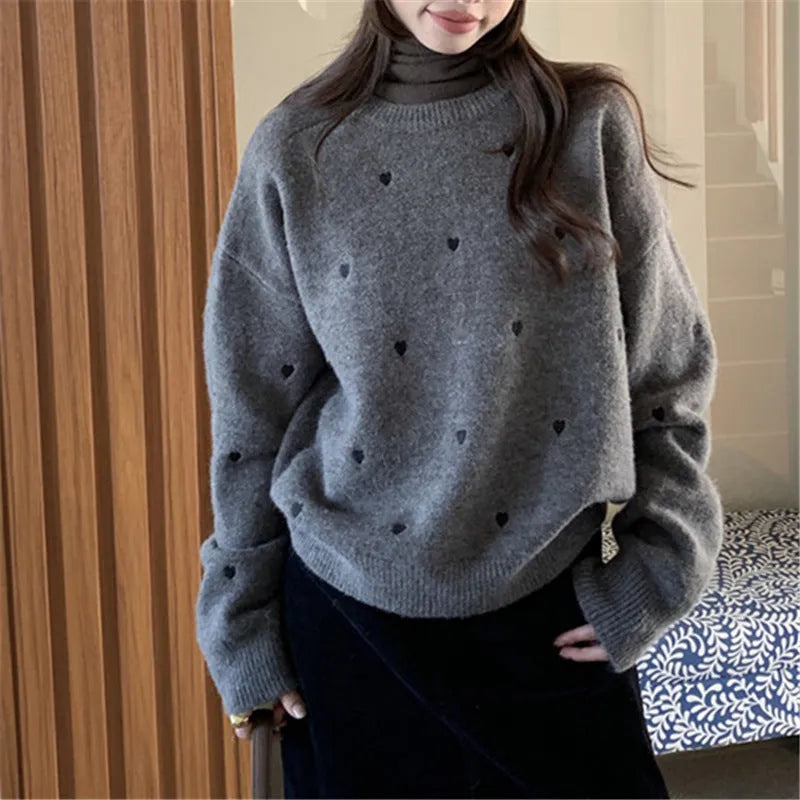 Women's loose acrylic pullover sweater with love embroidery in beige, grey, or pink.