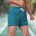 Men's black high-waisted fitness training shorts with drawstring waist closure