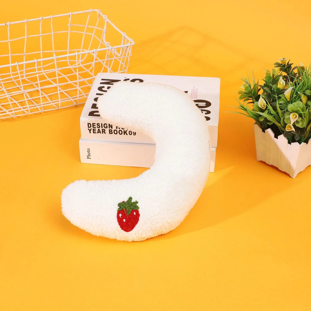 Half moon U-shaped cat pillow with cartoon dog and cat print in blue, pink, white, or yellow.