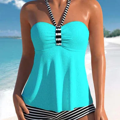 Women's off-shoulder swimsuit in black and white stripes and solid colours
