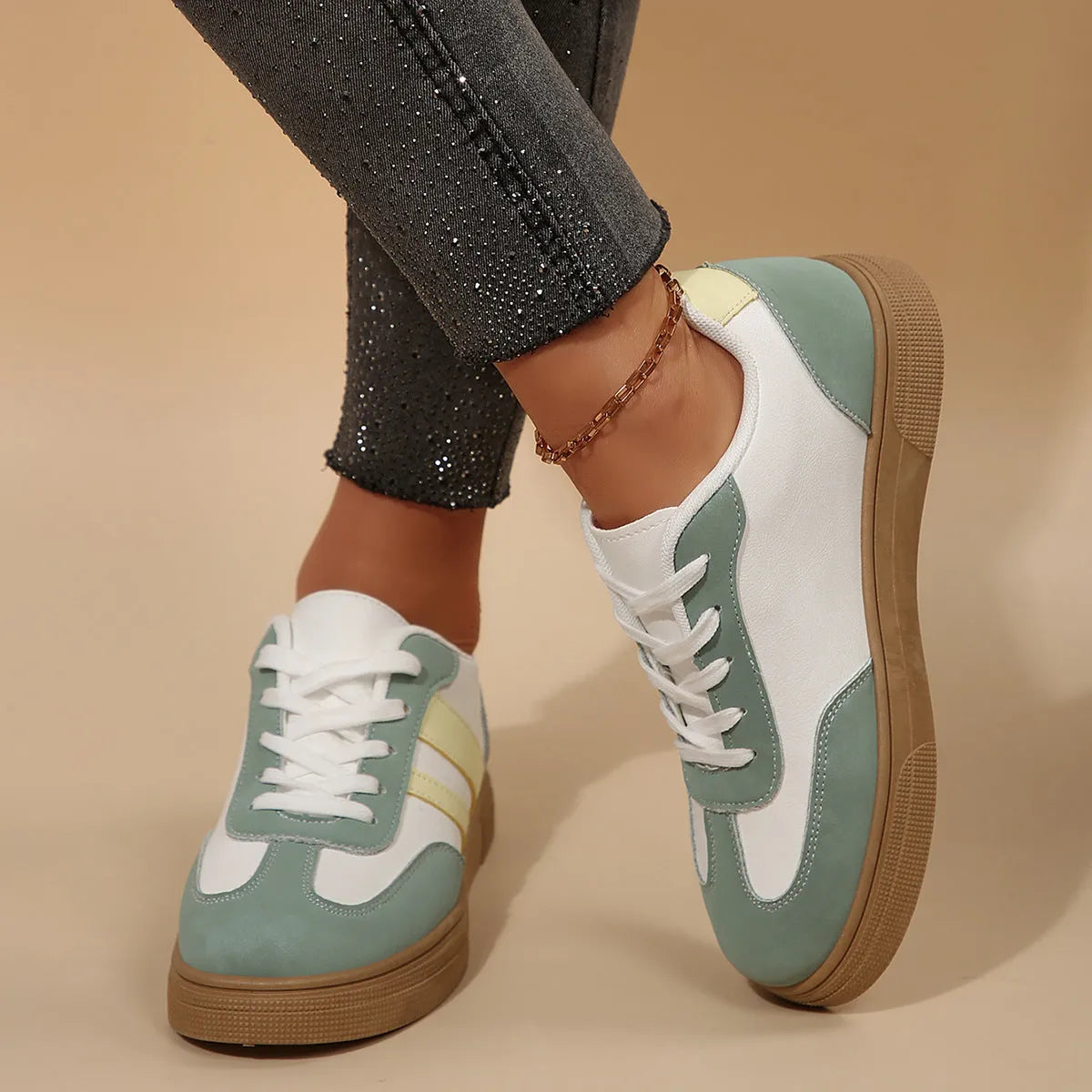 Green retro sports women's shoes with cross-strap design and low-top construction