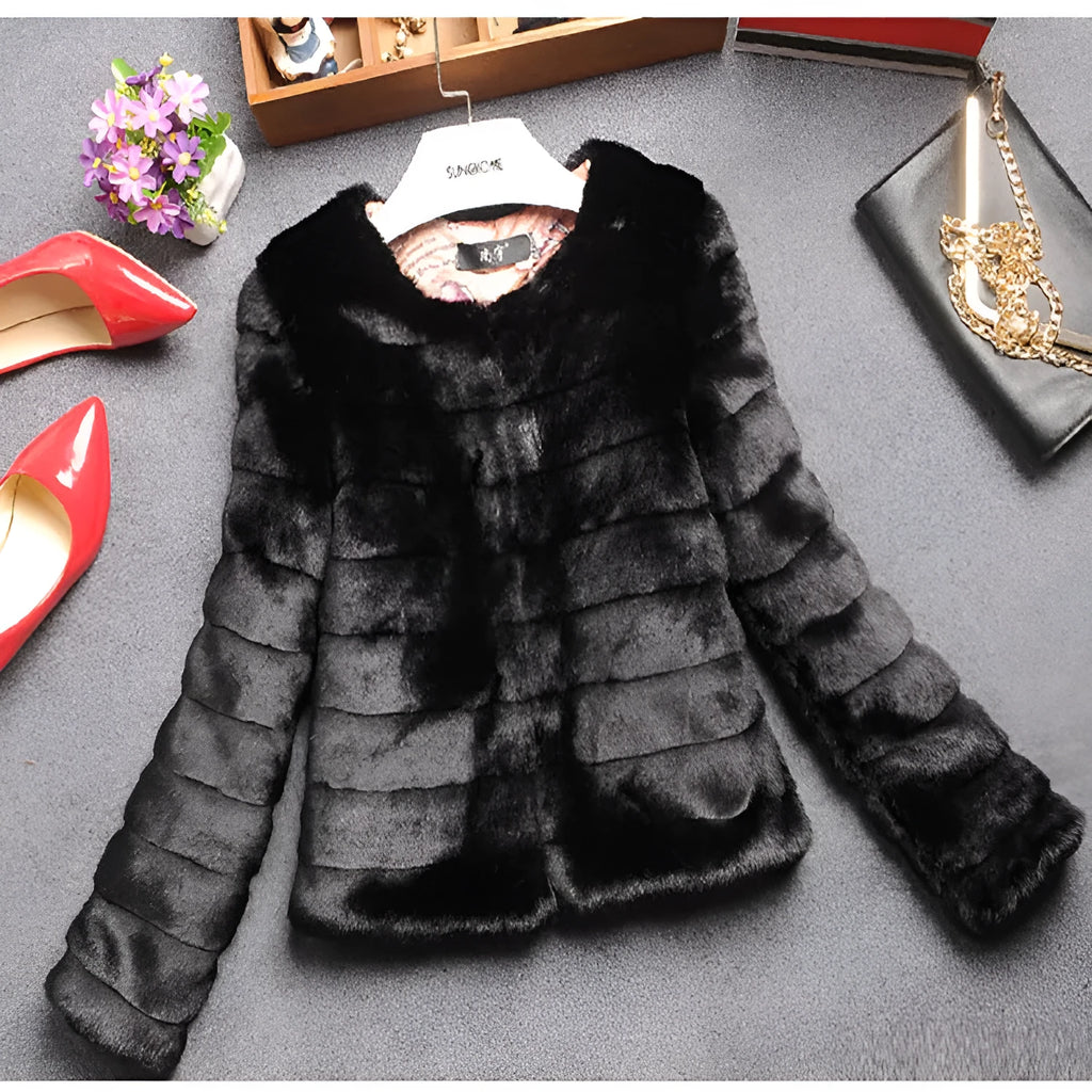 Women's short-length faux fur jumper in beige, shown with regular sleeves and a textured rabbit fur-style pile.