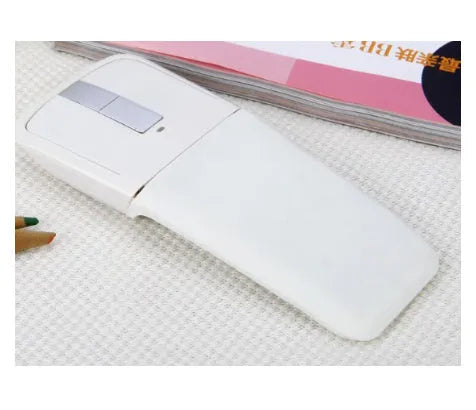 Folding Bluetooth wireless mouse shown in both open and closed positions with compact 131.2mm design