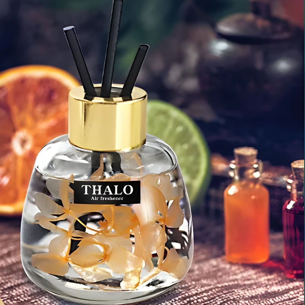 Clear glass bottle car perfume ornament for loose incense aromatherapy, shown in a car interior.