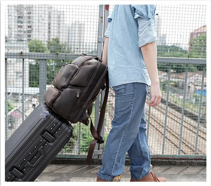 Dark brown leather men's backpack for 17-inch laptops with multiple compartments