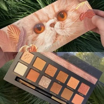 Explorer twelve-color animal eye shadow palette showing Golden Tiger Ink Cat, Red Fox, and Koi themed shades