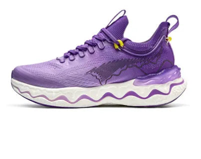 Women's cushioned running shoes with thick rubber soles in a no-lace design on a neutral background.