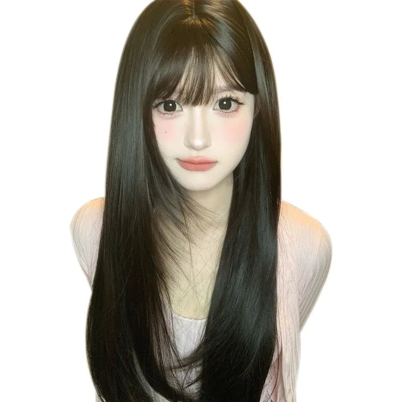 Dark brown long straight synthetic wig with a fringe on a wig head stand.