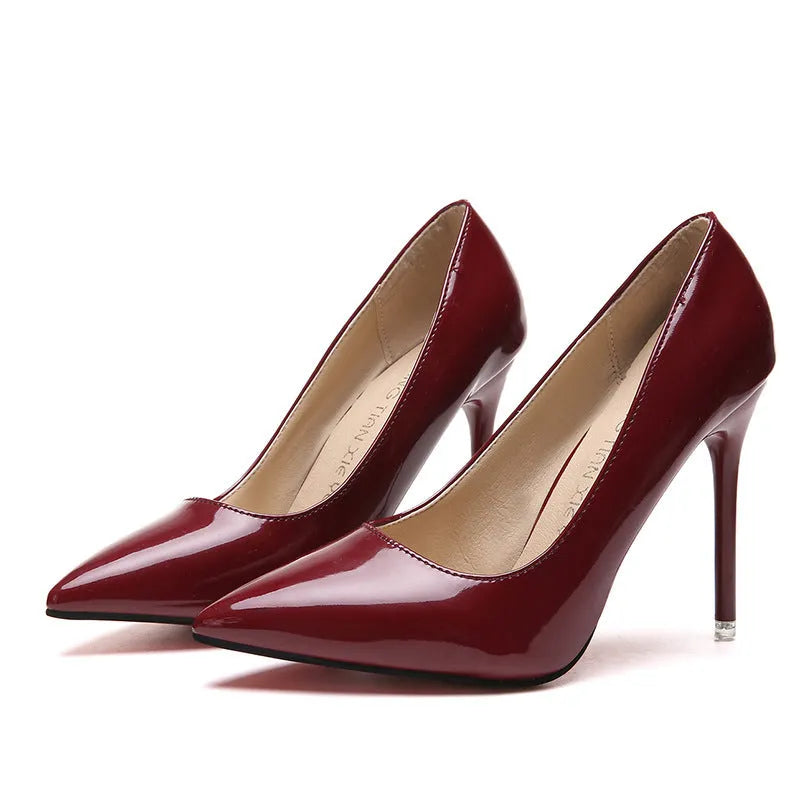 Women's pointed-toe stiletto heel pumps in apricot colour with a super high heel.
