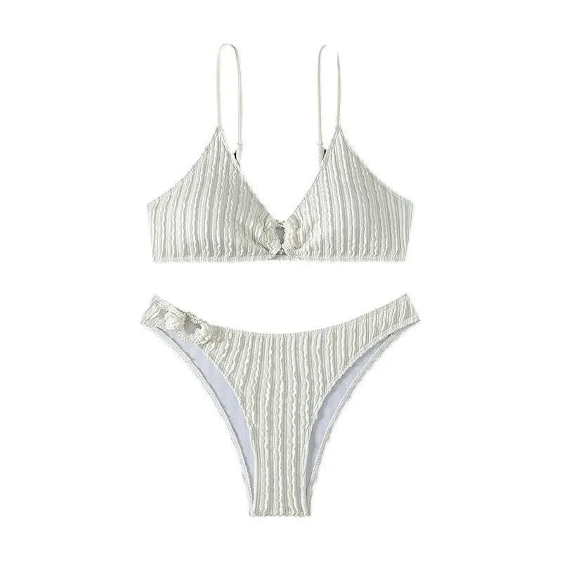 White women's V-neck sleeveless swimsuit with matching shorts for beach swimming