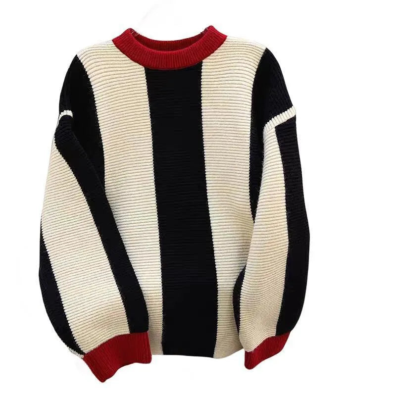 Women's striped cashmere knitted pullover sweater in contrasting colours with a round neck.