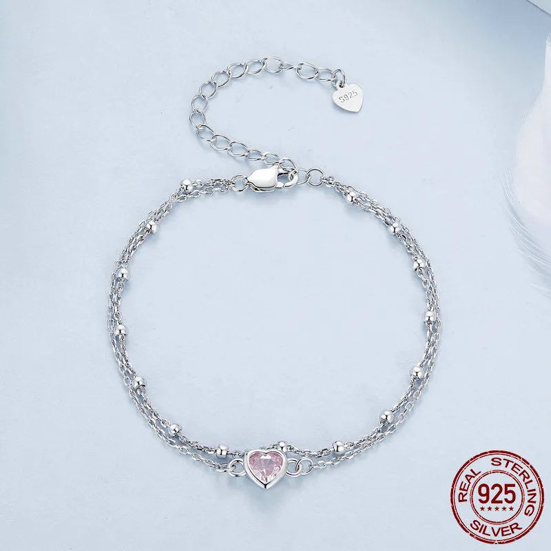 925 sterling silver bracelet with small heart pendant on an adjustable chain, style BSB152.