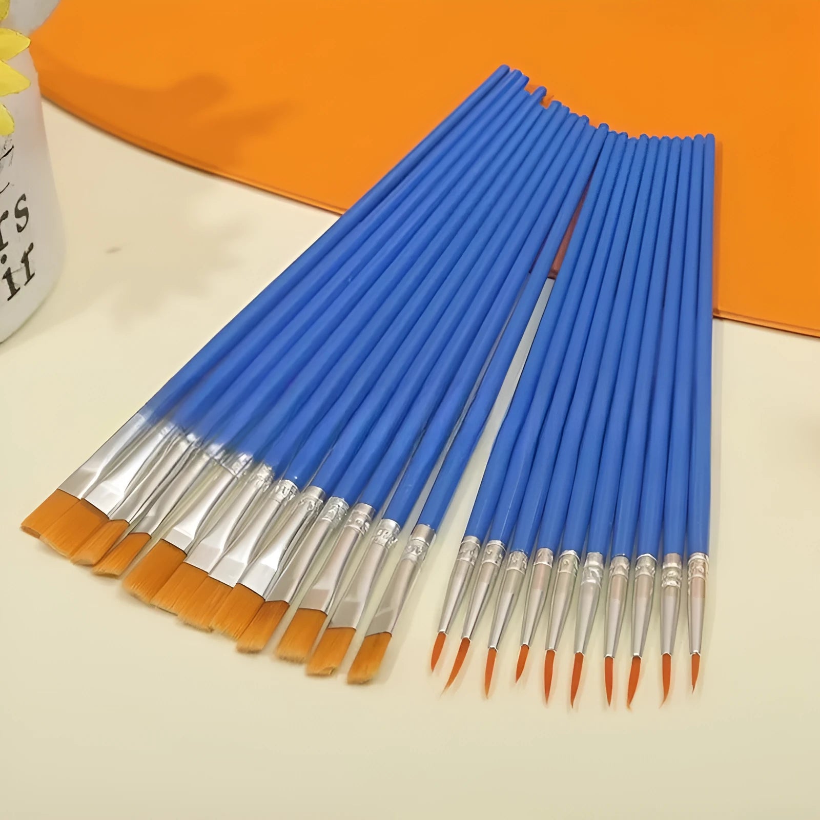 Children's graphic art gouache pen set with flat and hook line pens on a white background