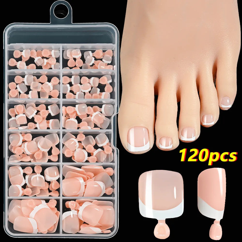 Box of 120 French white edge full square short nude toe nail tips on a white background.