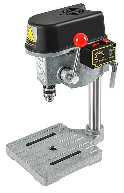 Mini bench drill milling machine with cross bench pliers on workbench