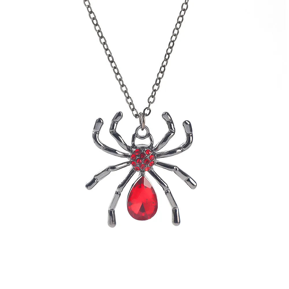 Gothic Halloween necklace with spider and bat alloy pendant on a chain.