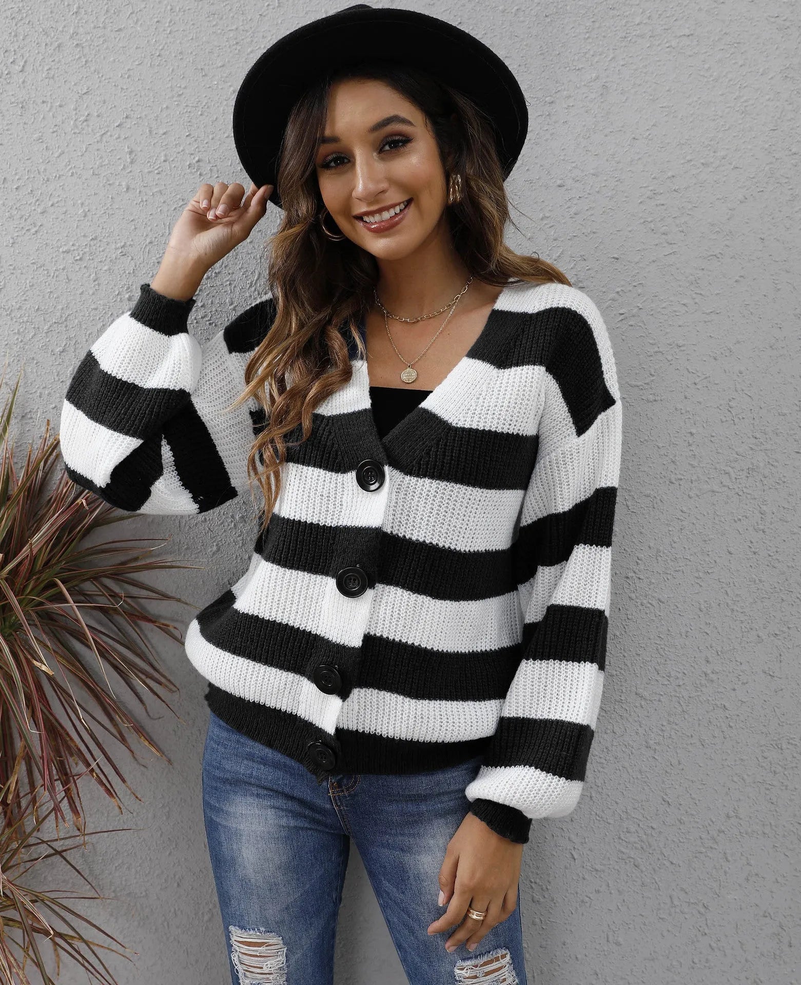 Women's striped cardigan in deer plush fabric with button front closure