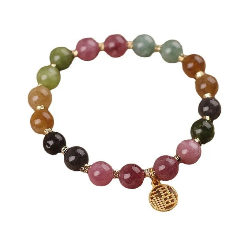 Natural colour tourmaline bracelet showing floral design option with electroplated silver finish
