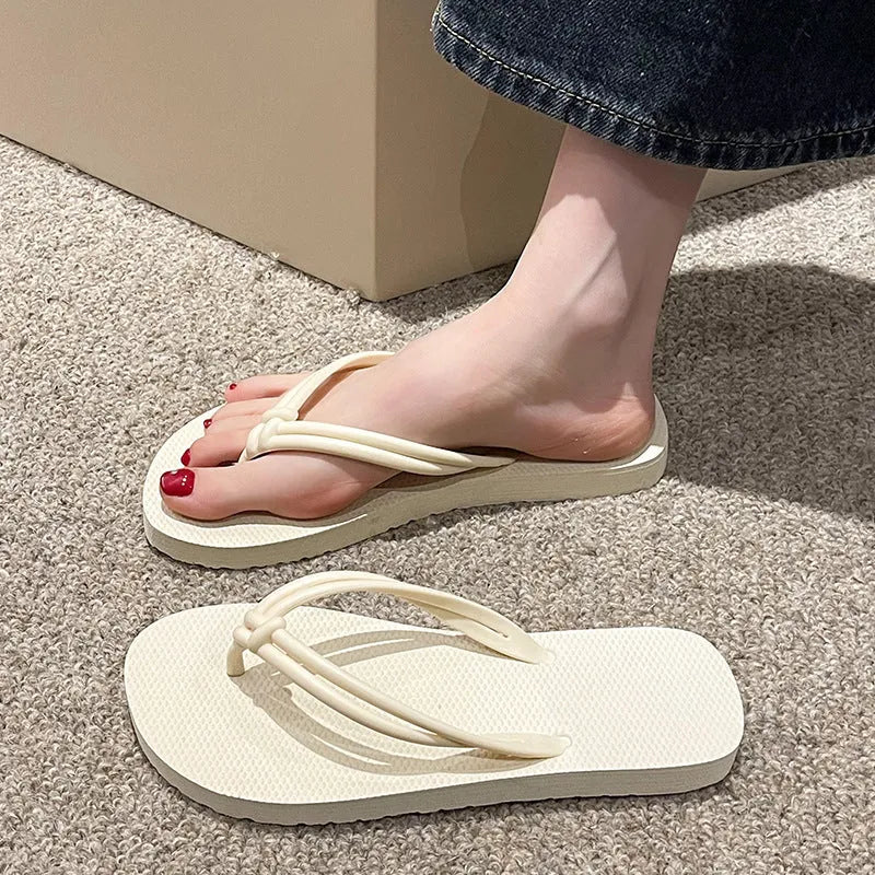 Men's closed-toe PVC flip flops in multiple colours on a plain background.