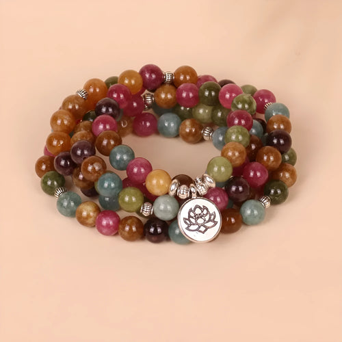 108 bead multi-layer bracelet with hanging lotus design in tourmaline colour