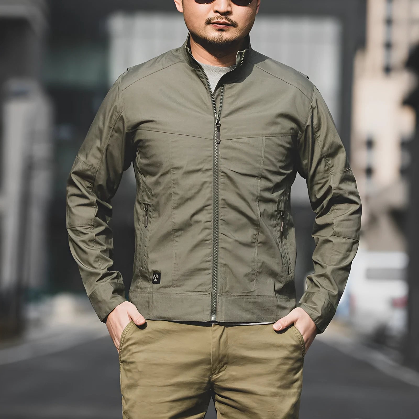 Men's tactical camouflage jacket in polyester fabric showing colour options including CP camouflage.