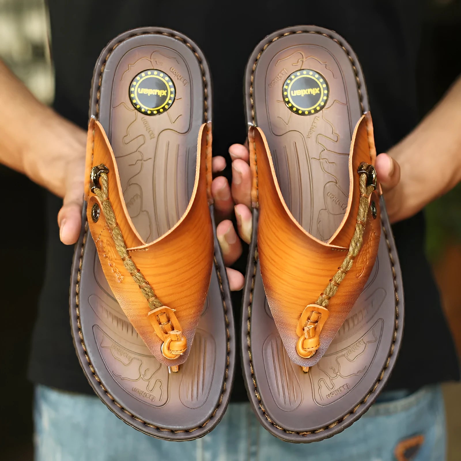 Men's dark blue herringbone-patterned outdoor slippers with a rubber sole, shown from the side.