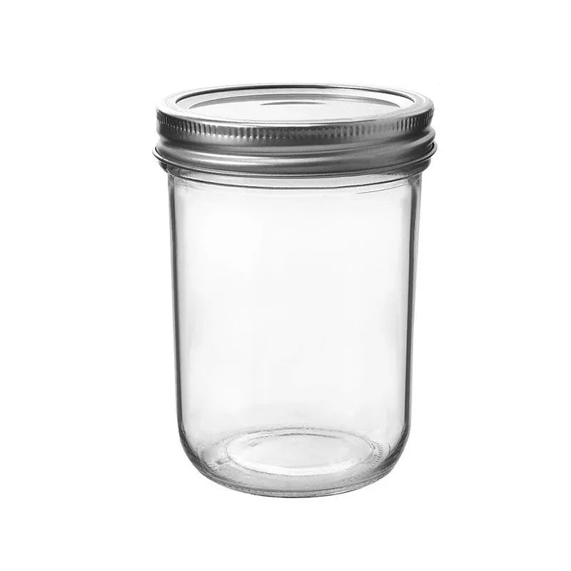 Six 16oz transparent glossy glass wide mouth sealed jars on a table