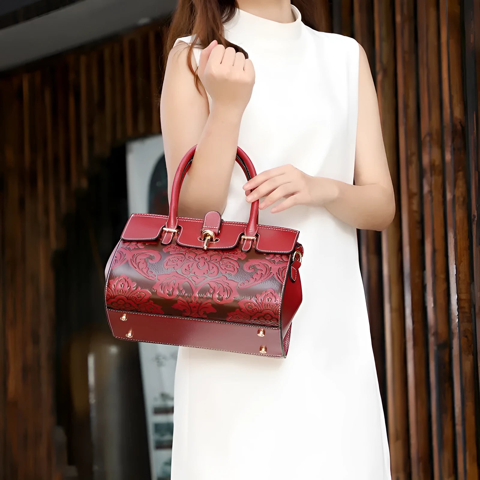 Genuine leather women's vintage crossbody bag in oval shape with embossed detailing