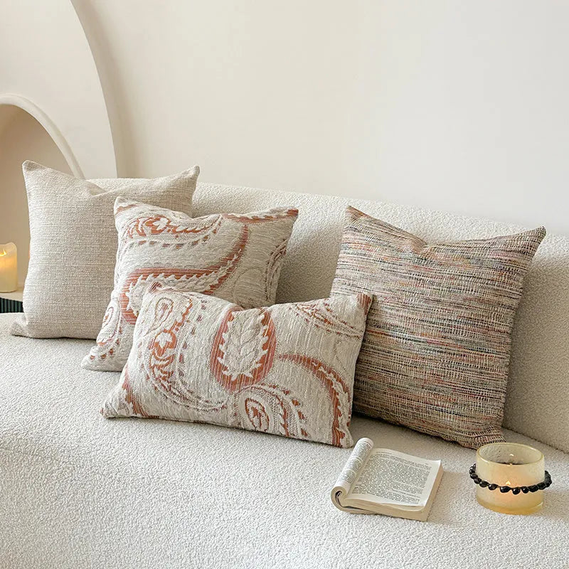 American-style jacquard sofa cushion cover with woven paisley and flower pattern in amber colours.
