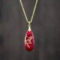 Jade pendant necklace with 18K gold-plated chain showing pendant design options