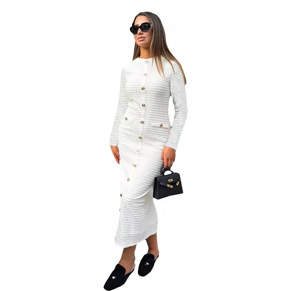 French retro slim fit knitted long-sleeved dress with button front in black or white.