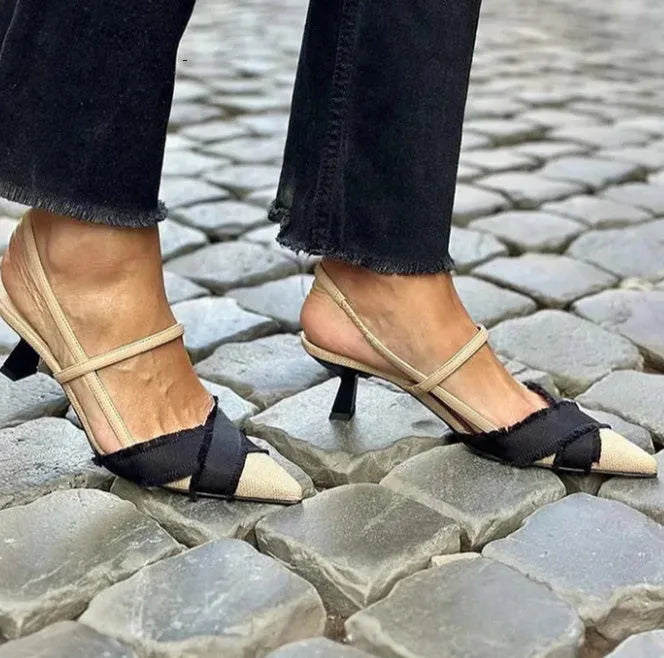 Women's apricot and black colour block stiletto sandals with a buckle fastening and pointed toe.
