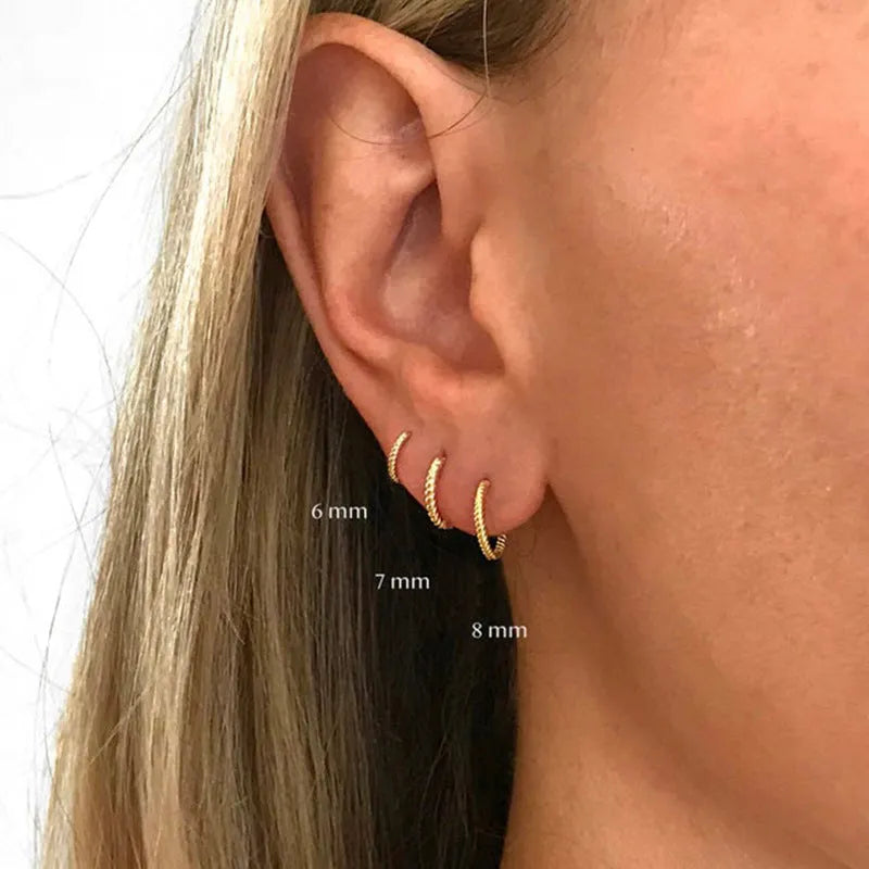 Sterling silver twisted string round earrings in gold or white gold colour